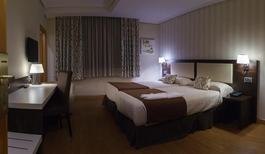 Quarto Individual — Hospedium Hotel Triana