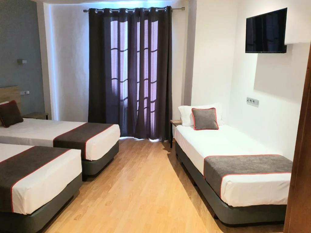 Quarto Triplo — Hospedium Hotel Vittoria Colonna
