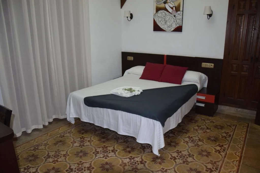 Quarto Duplo Superior — Hospedium Palacio del Gobernador