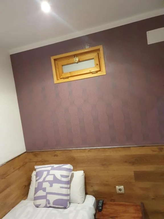 エコノミーシングルルーム・共用バスルーム — Hostal Abel Victoriano
