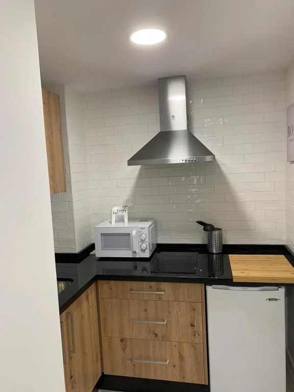 Estudio Deluxe con cama grande — Hostal Acemar