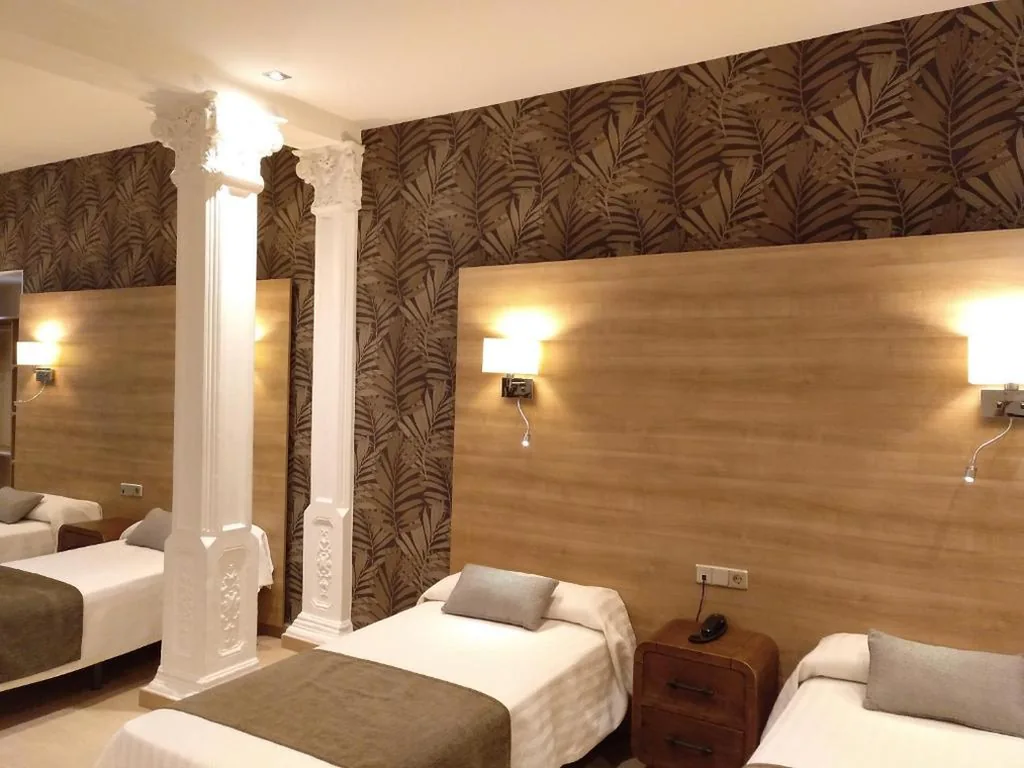 Vierpersoonskamer — Hostal Aguilar