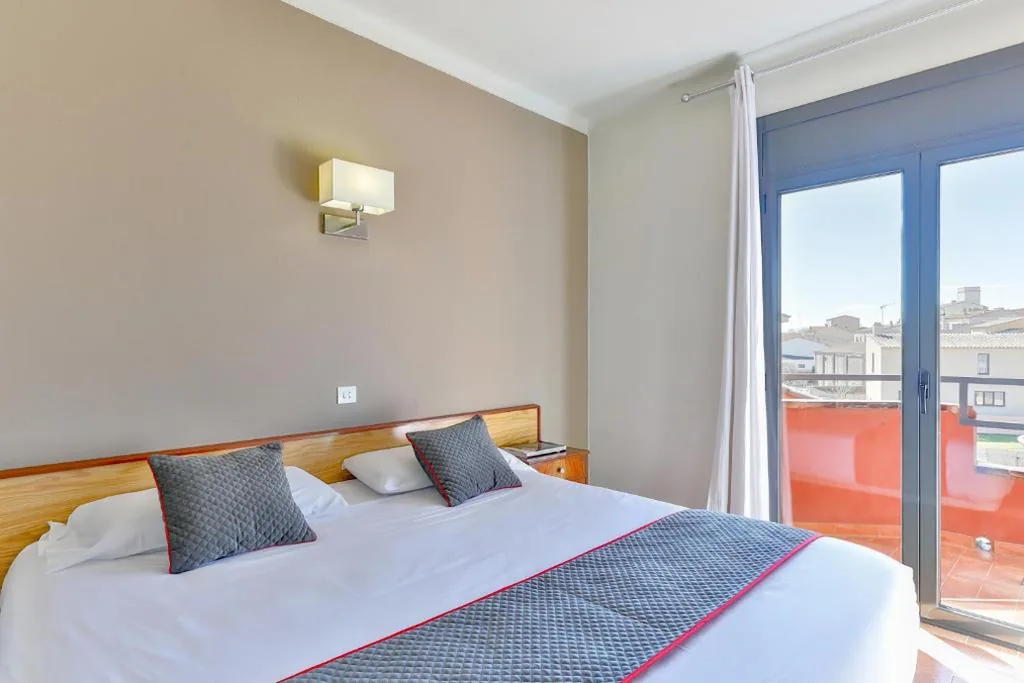 Tweepersoonskamer met balkon — Hostal Alberana