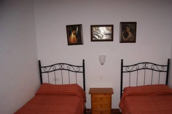 Camera quadrupla con bagno — Hostal Alcázar