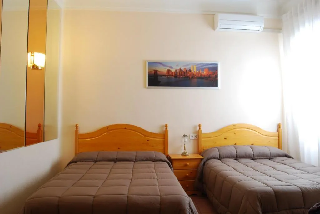 Habitación Quíntuple — Hostal America