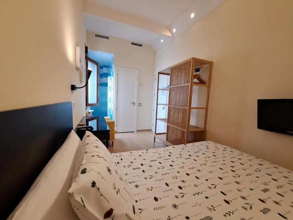 Habitación Individual — Hostal Arco Iris