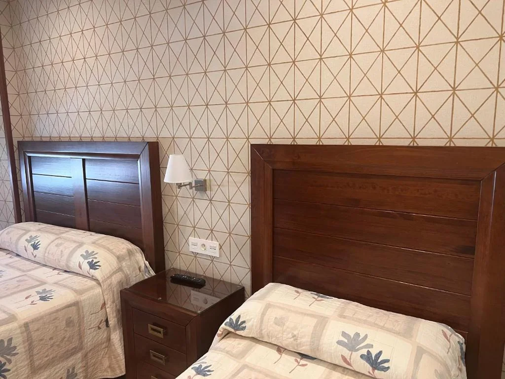 Quarto Duplo Familiar — Hostal Avenida