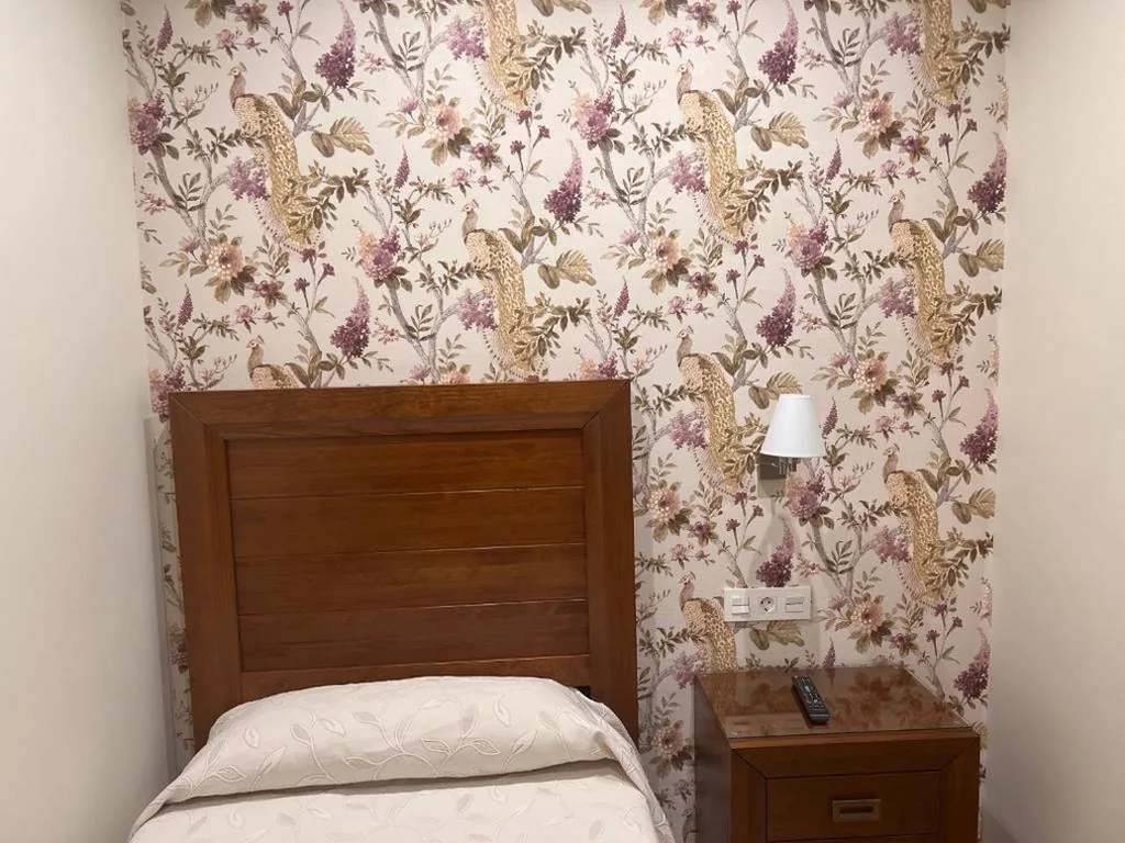 Quarto Individual — Hostal Avenida