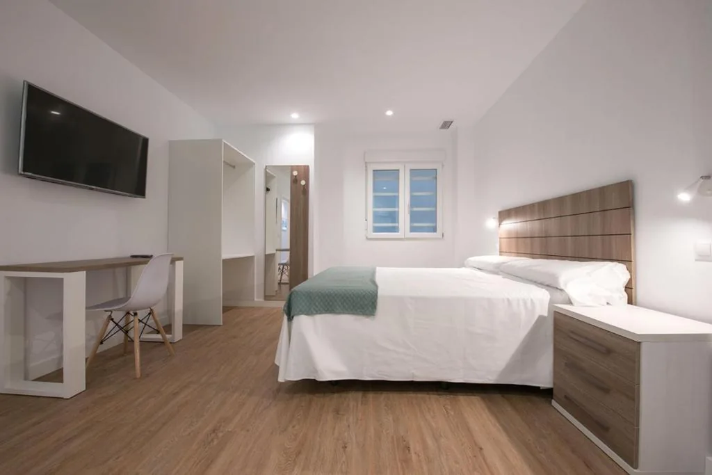 Habitación Doble Deluxe — Hostal Beach