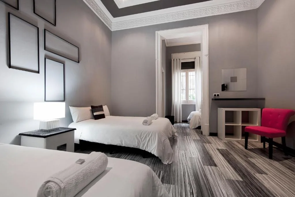 Habitación cuádruple — Hostal Boutique Khronos