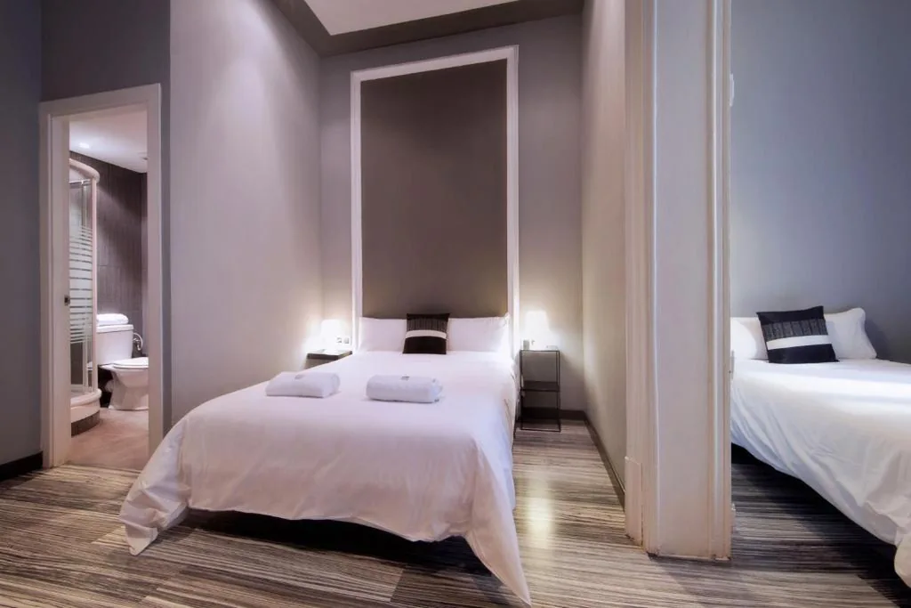 Habitación Triple — Hostal Boutique Khronos