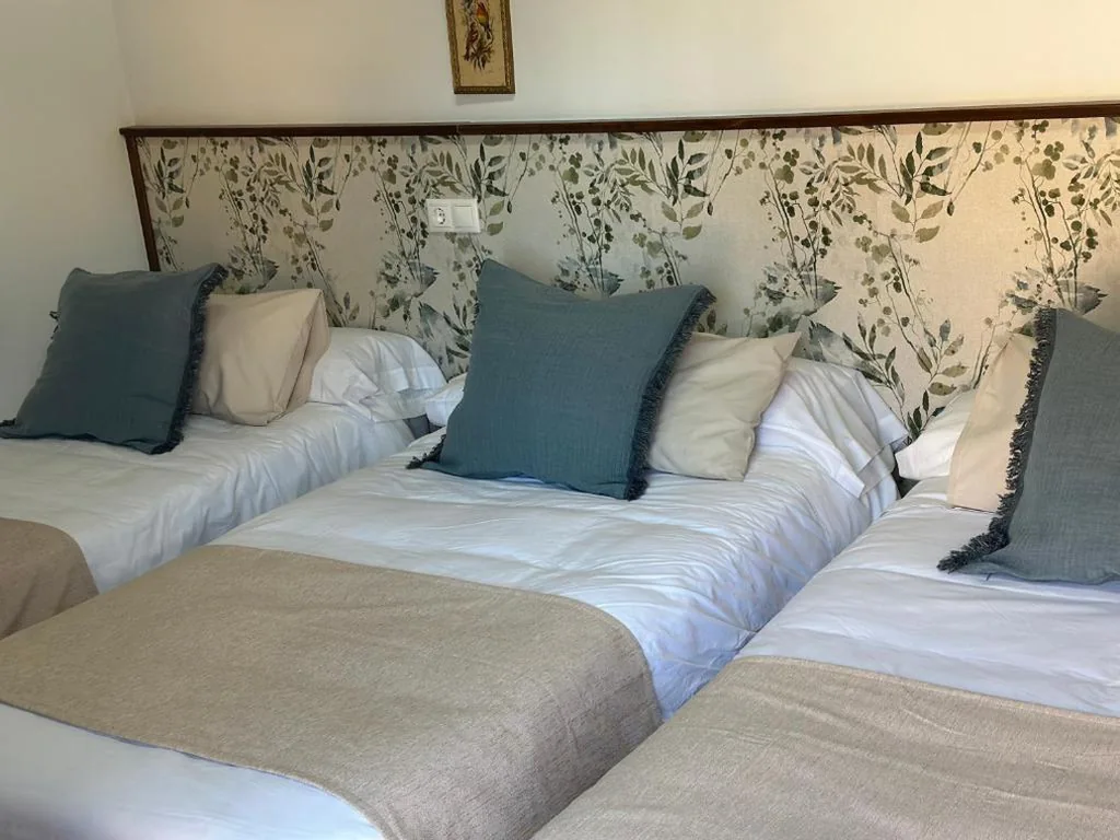 Classic Triple Room — Hostal Camarina
