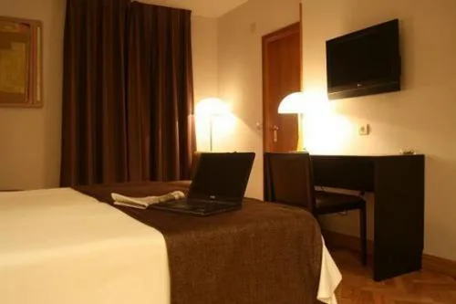 Quarto Individual — Hostal Carlos III