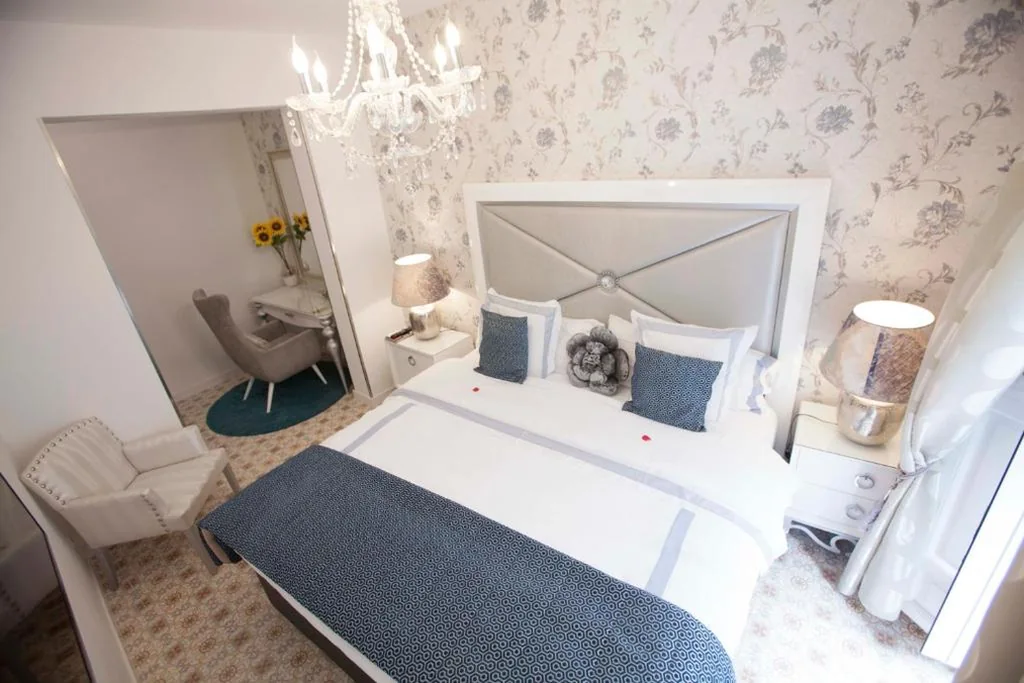 Suite Deluxe con cama extragrande — Hostal Casa Boutique