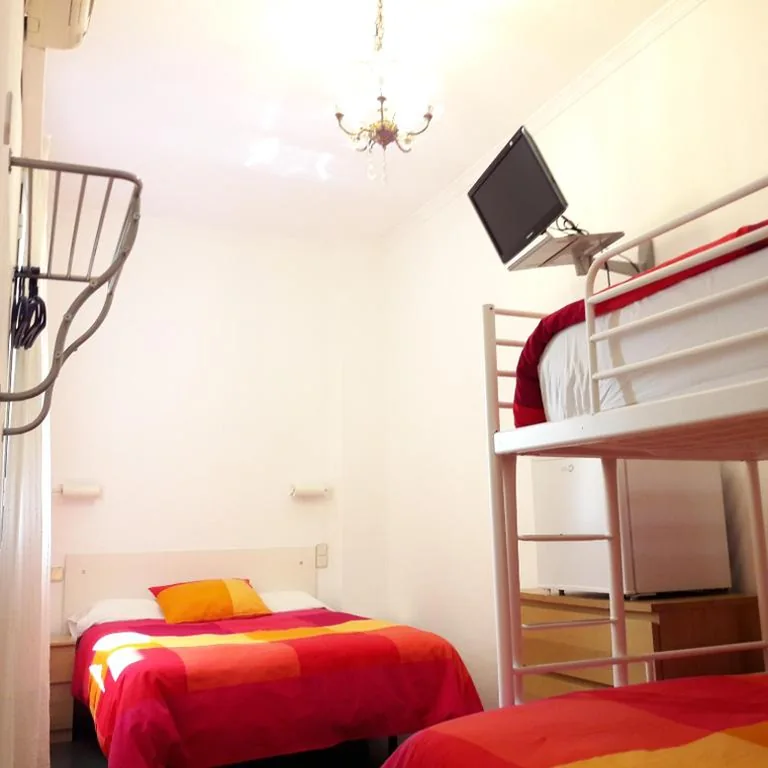 Quadruple Room — Hostal Casa Chueca