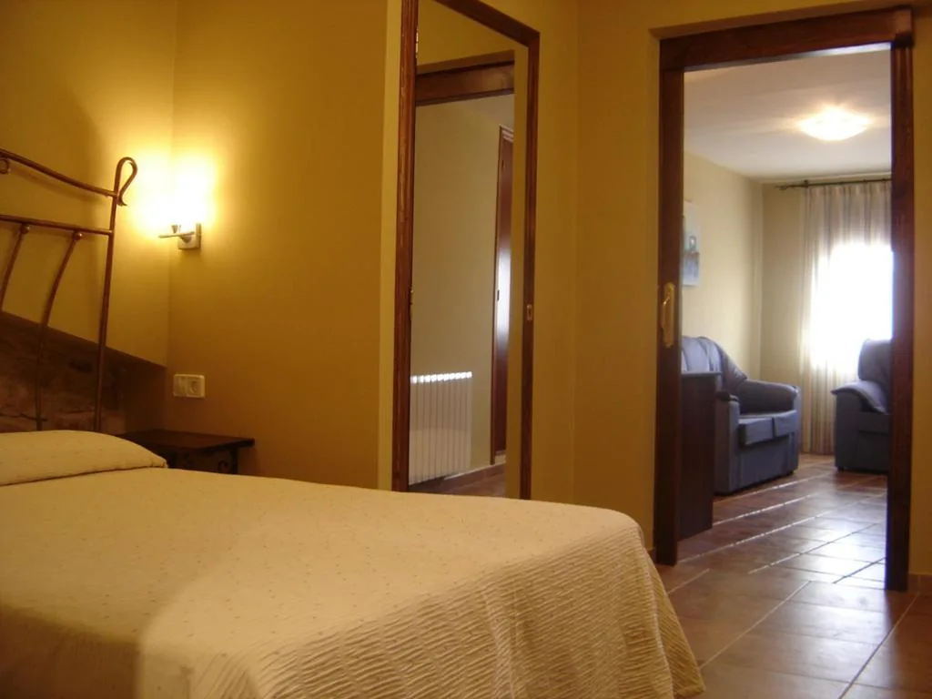 Suite Junior met terras — Hostal Casa Laure y Mª Jose