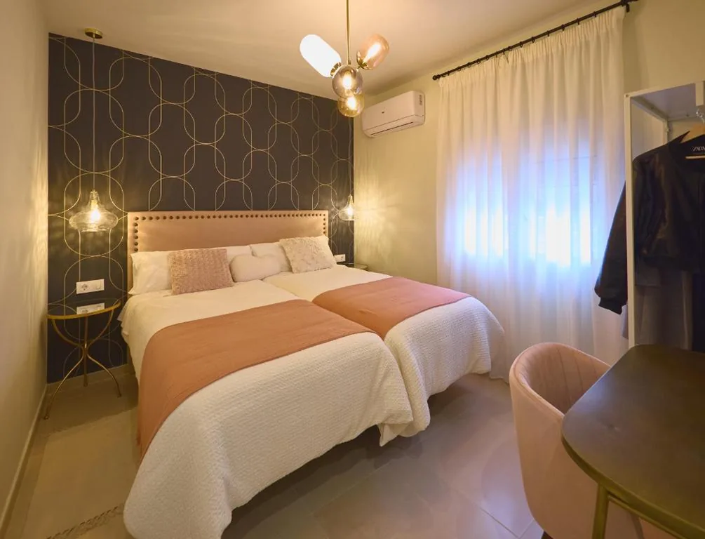 Camera doppia con 2 letti matrimoniali — Hostal Casa Maria