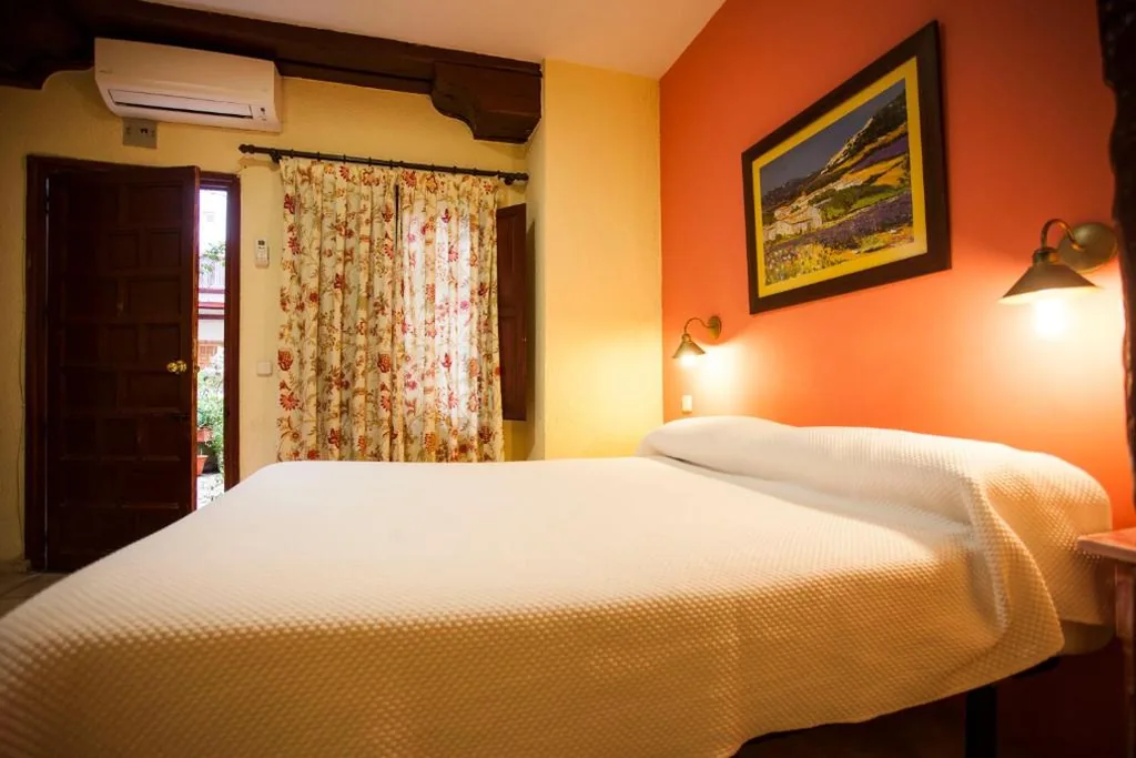 Camera doppia con letto supplementare — Hostal Castilla