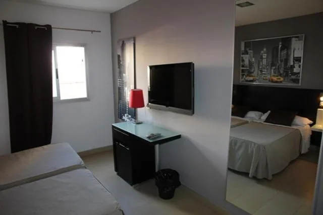 Habitación Triple — Hostal Central