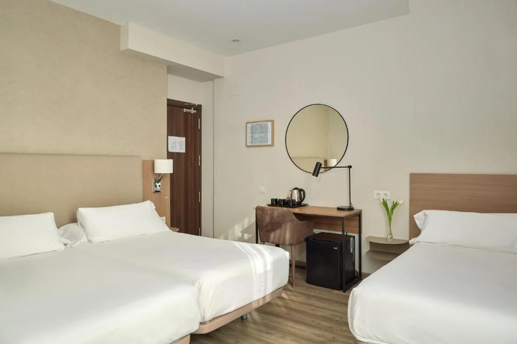 Superior Triple Room — Hostal Centric