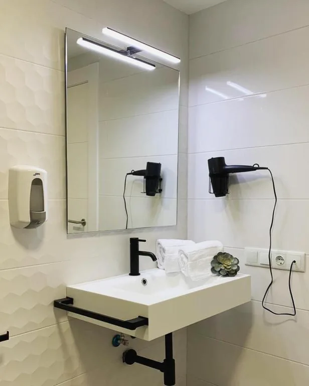 Quarto Individual — Hostal Comfort Suites