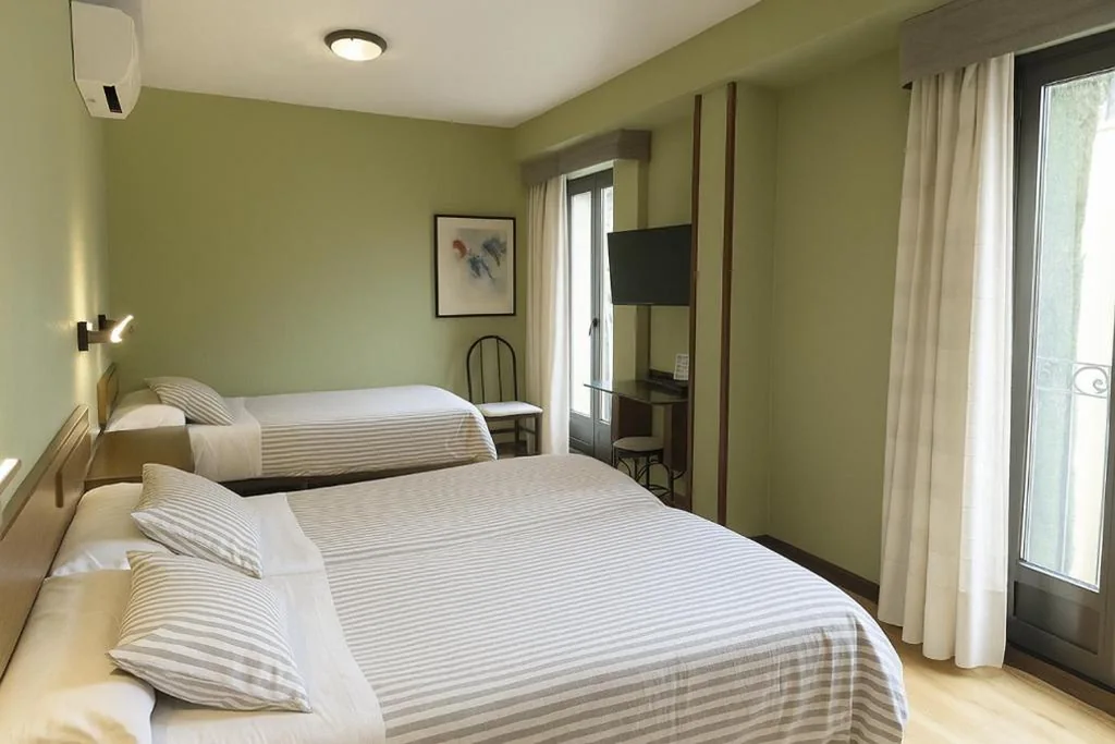 Habitación Triple — Hostal Concejo