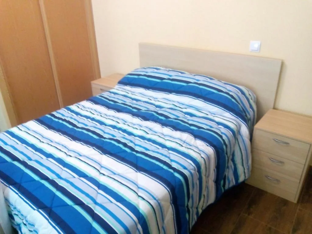 Habitación Deluxe con 2 camas grandes — Hostal Cuatro Torres