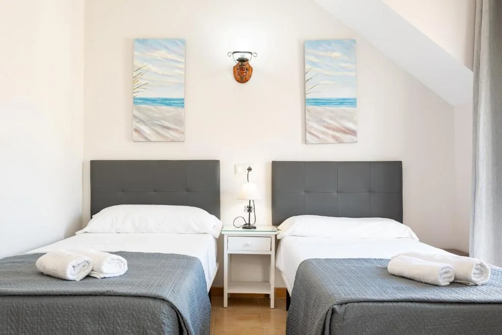 Quarto quádruplo — Hostal Cuevas