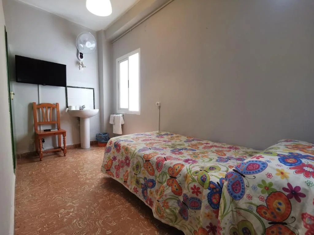 共用バスルーム付きシングルルーム — Hostal Doña Carmen