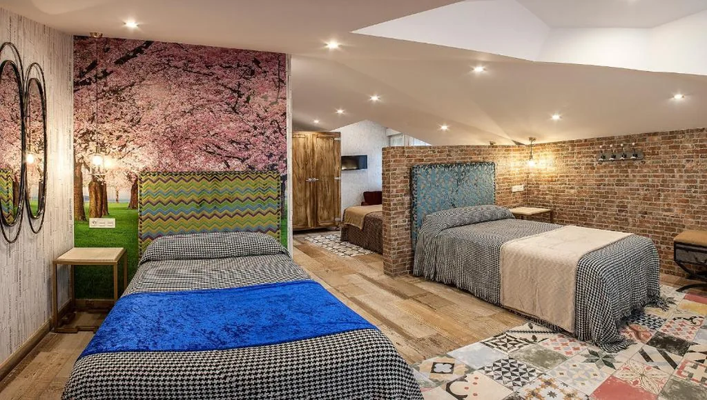 Dreibettzimmer — Hostal El Aparcamiento