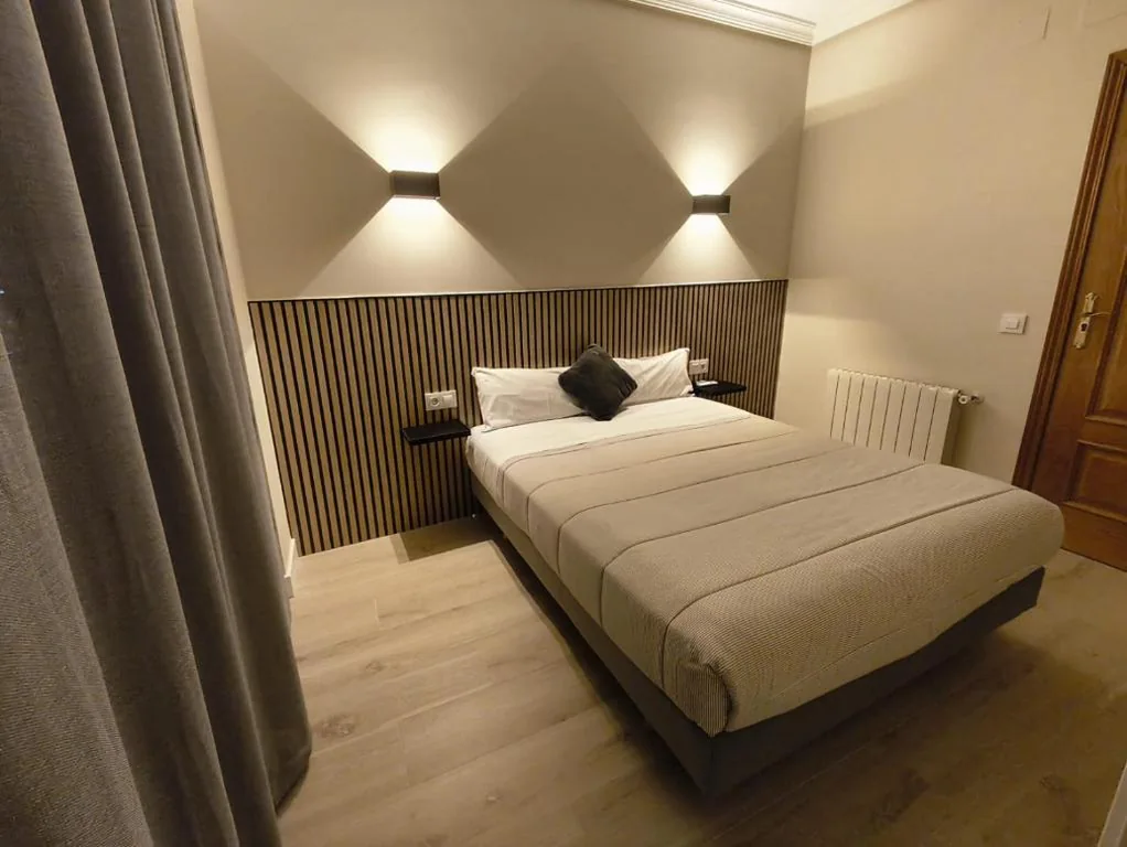 Quarto Duplo com serviço gratuito de transporte para o aeroporto — Hostal El Cruce