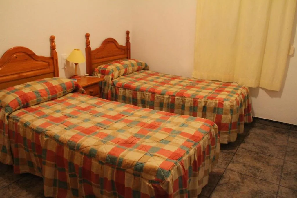内庭院双人间（两张床） — Hostal El Mirador