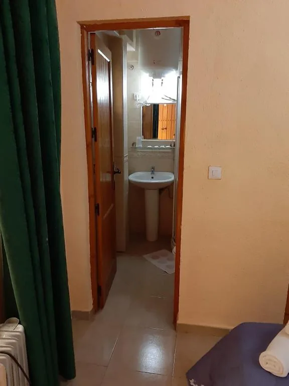 Quarto Quádruplo — Hostal El Patio