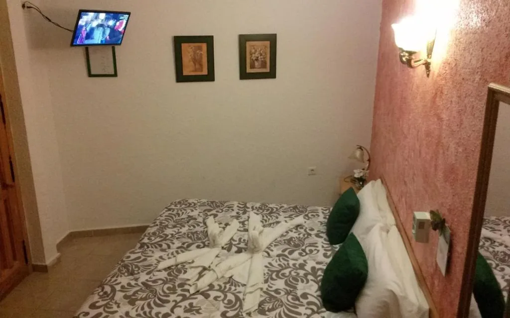 Quarto Triplo — Hostal El Patio