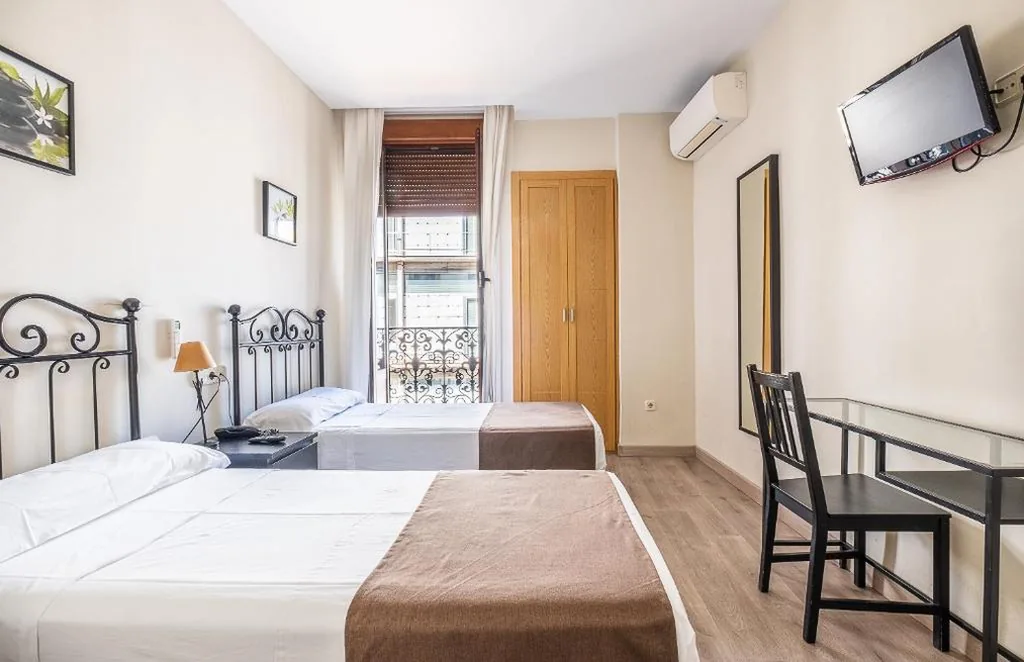 Vierbettzimmer — Hostal El Pilar