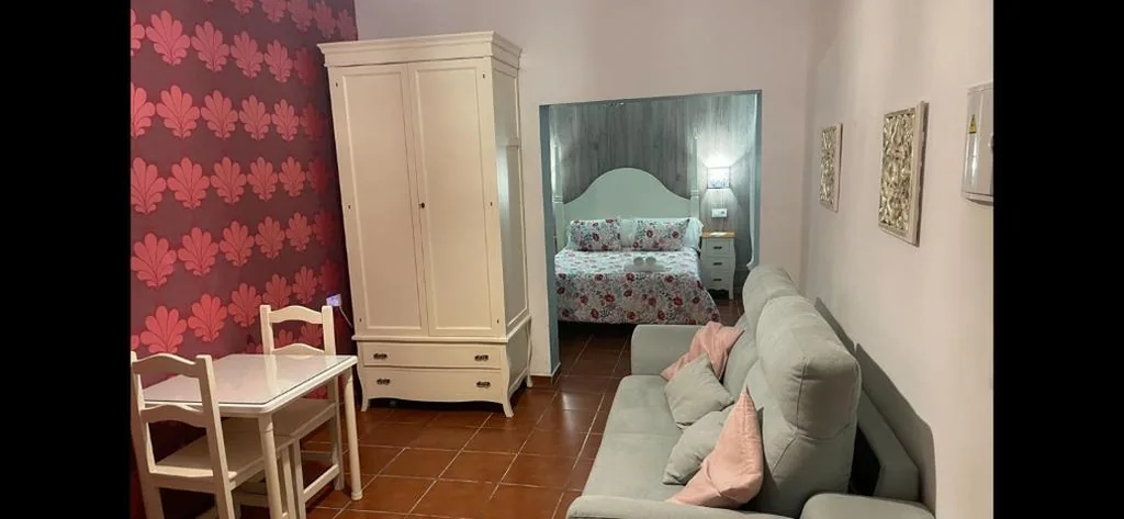Chambre quadruple — Hostal El Puerto Boutique