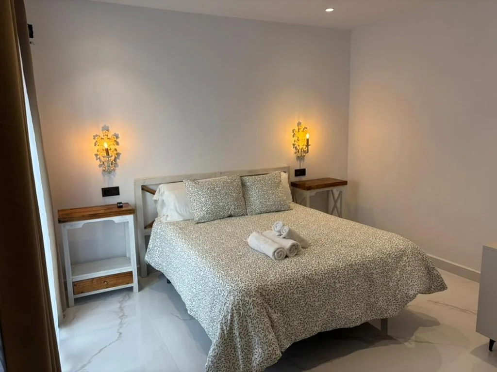 Chambre triple Deluxe — Hostal El Puerto Boutique