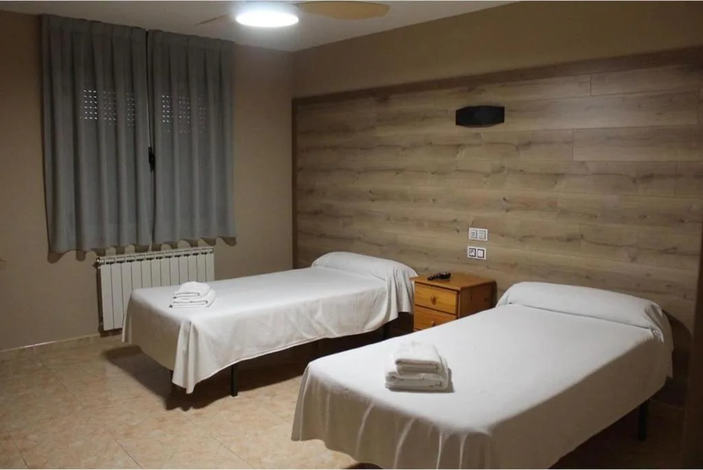 Camera quadrupla — Hostal el secreto