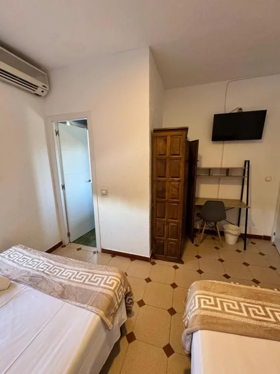 Quarto quádruplo — Hostal El Torero