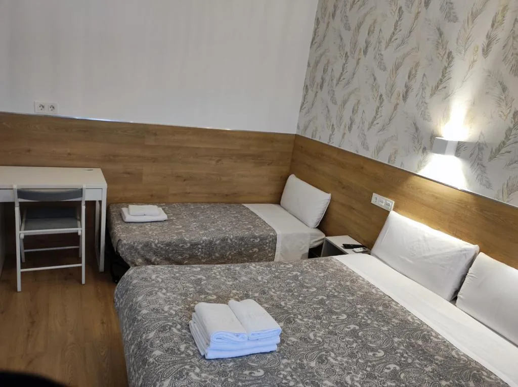 带加床的双人间 — Hostal Esparteros