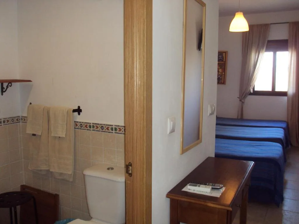 Quarto Triplo — Hostal Fenix