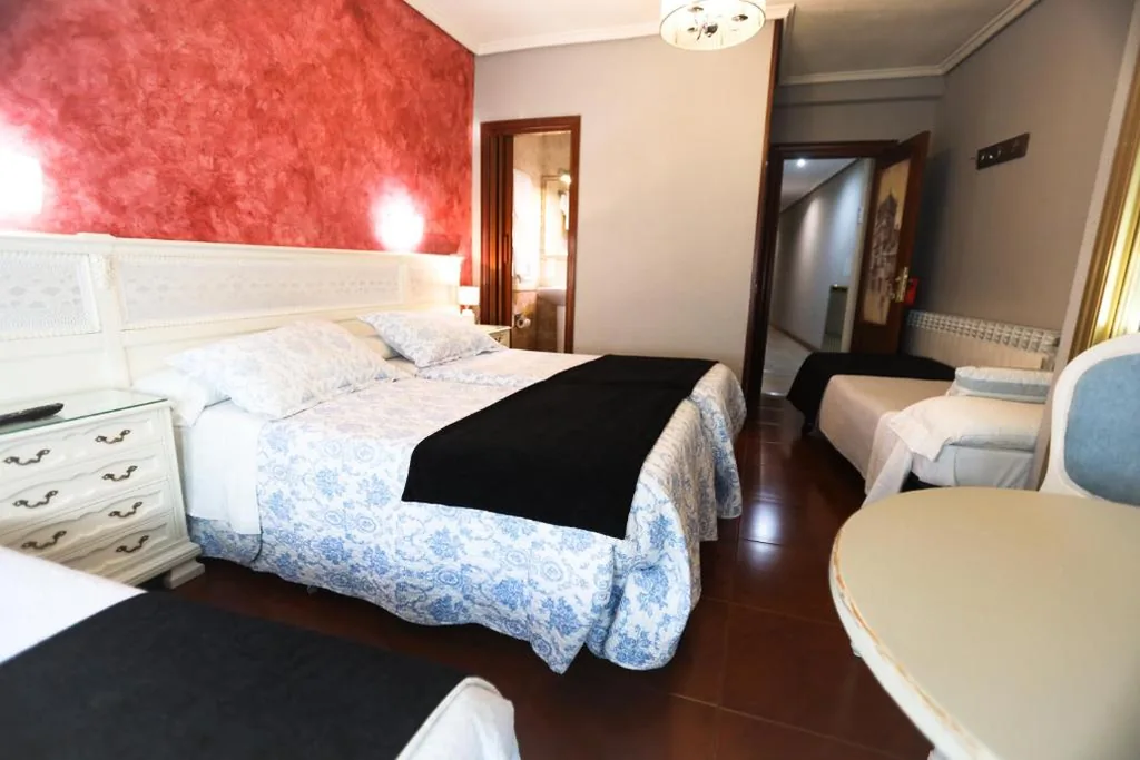 Habitación Familiar — Hostal Goya Suites