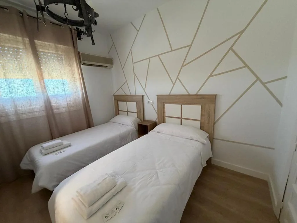 Tweepersoonskamer met eigen badkamer — Hostal Gran Capitán