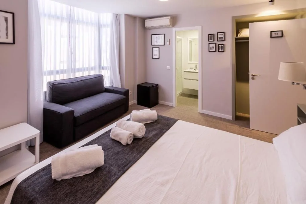 Suite Familiare — Hostal Gran Vía