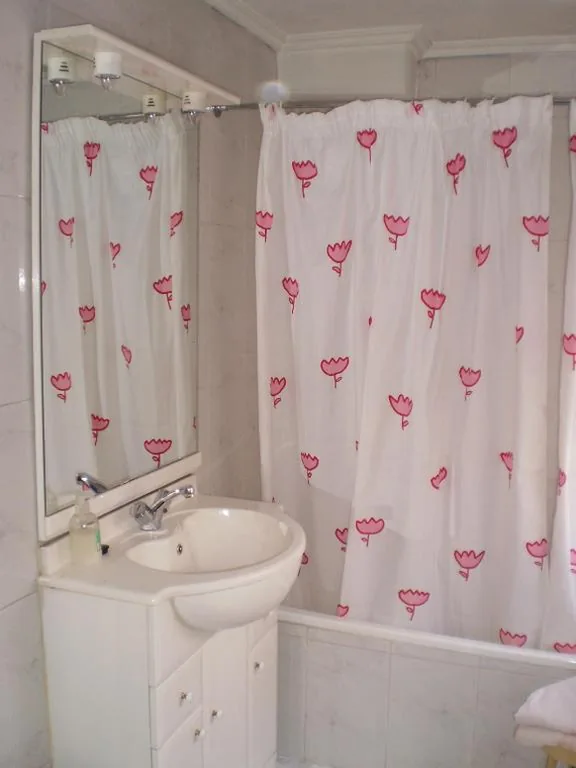 Habitación cuádruple — Hostal Hilton