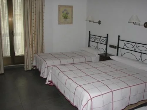 Quarto Familiar — Hostal Ivor