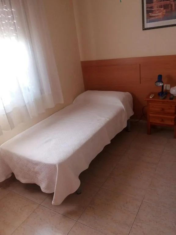 Eenpersoonskamer met gedeelde badkamer — Hostal Jose Luis
