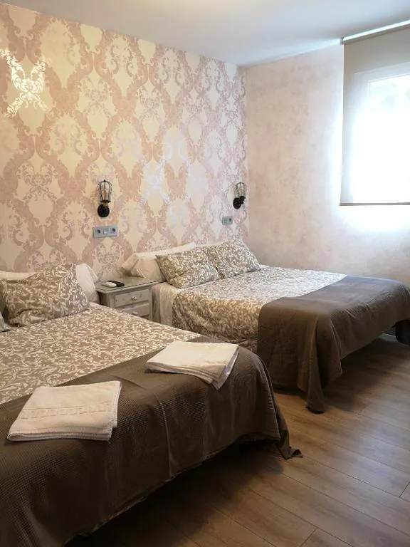 Quarto Quádruplo Clássico — Hostal Juan Bravo