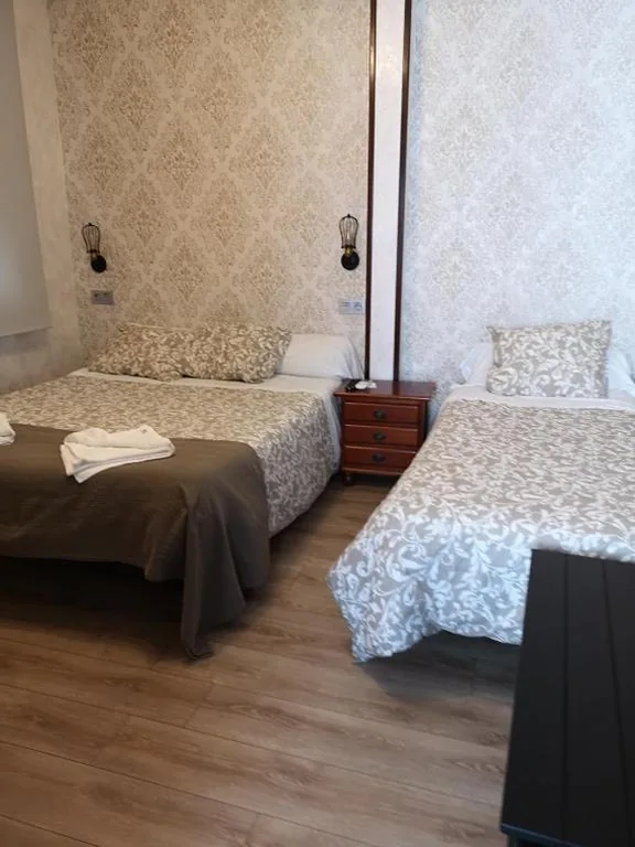 Quarto Triplo — Hostal Juan Bravo