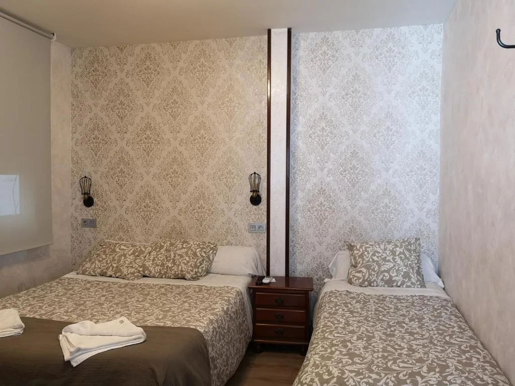 Quarto Triplo — Hostal Juan Bravo
